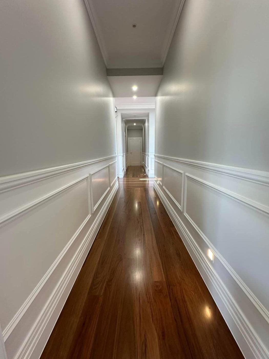 Hallway with wainscoting